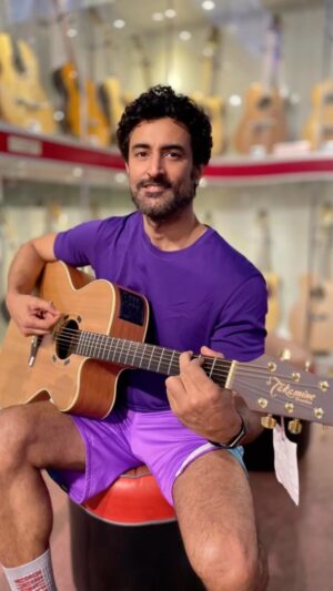 Kunal Kapoor Instagram - The boy in a toy store,
A smile of his face,
Dreaming of songs and stories to tell,
His mind in a happy place. 
#deeppurple