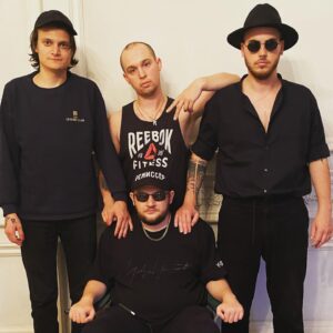 Kuzma Gridin Instagram - Объясняю. Несколько месяцев назад посчастливилось познакомиться с популярной молодежной группой Russian Village Boys. Знакомство наше предвосхитила дота. Ребята играют очень плохо, но в турбе рейтинг не сливаешь, поэтому не страшно. Пару раз выпили вместе, но в меру и очень культурно. Ребята сказали, что у них выходит новый трек, я предложил свою помощь в придумывание клипа. В итоге было принято решение, что выступлю режиссёром. Работу свою оцениваю достойной. Заметил за собой 2 ошибки за весь промежуток съёмок, но не критичных. Фотографирует нас Лариса, жена Дениса. Я снова домой вернусь поздно, но свою жену, Катеньку, я предупредил и она обиды не держит. Ждите в скором времени большую премьеру и мой режиссёрский дебют.