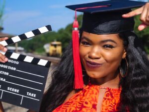 Kyanna Simone Simpson Instagram - B.A. in Entertainment and Media Studies w/ a minor in Spanish!🐶👩🏾‍🎓✨ How do I plan to use my degree? 🎬Filmmaking!🎬 I’ve been studying the ins and outs of various media industries for the last 4 years! Now, it’s time to apply it all to producing and directing film and television (along w/ my acting career of course!!)🎞🎞 This is only the beginning!!! 
•
📸: @senaiteshots 
YESSSS, SENAITE MURRAY BACK AT IT AGAIN W/ THE WHITE VANSSSS 🤪🔥@yungsenaite 
•
Hair slayed by: @tairon_salahuddin ✨👩🏾‍🎓
•
Face beat by.... MEEE🥰👩🏾‍🎓
•
#FUTUREFILMMAKER #UGAGRAD #GradyCollege #GoDawgs #DreamsDoComeTrue #IHopeYouDance