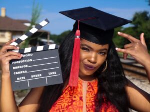 Kyanna Simone Simpson Instagram - B.A. in Entertainment and Media Studies w/ a minor in Spanish!🐶👩🏾‍🎓✨ How do I plan to use my degree? 🎬Filmmaking!🎬 I’ve been studying the ins and outs of various media industries for the last 4 years! Now, it’s time to apply it all to producing and directing film and television (along w/ my acting career of course!!)🎞🎞 This is only the beginning!!! 
•
📸: @senaiteshots 
YESSSS, SENAITE MURRAY BACK AT IT AGAIN W/ THE WHITE VANSSSS 🤪🔥@yungsenaite 
•
Hair slayed by: @tairon_salahuddin ✨👩🏾‍🎓
•
Face beat by.... MEEE🥰👩🏾‍🎓
•
#FUTUREFILMMAKER #UGAGRAD #GradyCollege #GoDawgs #DreamsDoComeTrue #IHopeYouDance