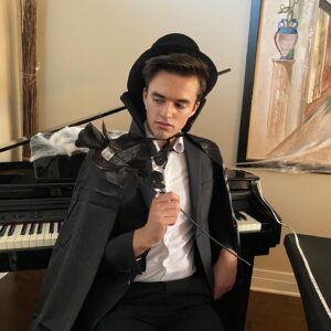 Kyle Meagher Instagram - Happy Halloween!!! 
Spreading a little magic this Hallows Eve is uh, me!? 

Second pic is my pre-Halloween attire, which I thank @flossieofficialwear for the Merch :) 
(My sister started this company! Check out her account!!) 

Hope y’all have a fantastic Halloween!! 

#halloween #magician #magic #spooky #IKnowItIsntAsCrazyAsOtherPeoples #ButHey #ThatsHowItBeWhenItDo