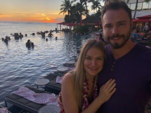 Kym Jackson Instagram - And theeen 6 months after we started dating - when your plans of proposing at burning man with a plastic electric glow ring @paultahoe and @brianaevigan found didn’t work out (I stole the ring from your bag because it was shiny and you couldn’t get reception to call my dad for permission) - you took me to Hawaii to “meet your parents”.

You proposed on the beach just after Sunset with a song you’d written the day before.. you remembered most of the words and made up the rest on the spot and it was absolutely perfect! 😻😻😻

My response was easy: “of course I will! Of course!!!”

#engaged #engagedlife #fuckyes #soulmates #bestfriends #storyofus #thestoryofus #hawaii #proposal #husbandmaterial #happiliyeverafter #kahala #kahalahotel #sheratonhawaii