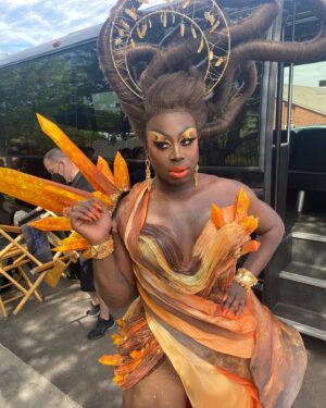Laila McQueen Instagram - Last weeks stop on @werehere brought us to St George Utah, where we had one of my personal favorite entrance looks. 
The directive was mimic the organic nature of where we would be shooting and I’m just obsessed with what the whole team did to achieve this entire look. Very proud of all of us <3
-
The makeup I did is heavily inspired by the incomparable talents of @naezrahlooks - Truly one of the best makeup artist out there and have been in complete awe of their mind and work for years. 
Hair @wigsandgrace 
Outfit @realdominocouture