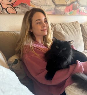 Laura Ashley Samuels Instagram - Welp. I guess I have a cat now. This is Rosemary. Rose. Roz. Elvira. Mistress of the dark. Kitty. Parmesan. Miss lady. She has a lot of names. And comes to all of them. I mostly enjoy how much she enjoys sitting on my lap!
