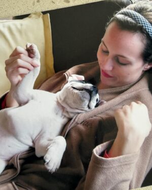 Laura Vissaritis Instagram - On this day, 15 years ago, the sun rose to a time that would change my life forever. I still remember the first time I saw him. His little white and chubby body and two asymmetrical patches across his perfect face - his 9 week old bum sat on my lap to which my heart simultaneously swelled and I promised him I would take care of him; that there was nothing I wouldn’t do for him. 

And so, over the past 15 years that is how we have lived together. I remember telling my partner ‘just so you know, I’ll never love you like I love Chester’. To which he replied ‘that’s ok, I’d feel the same’. (That’s when I knew he was the one by the way.)

To be able to spend more time with him, I changed careers - went back to study dog behaviour and training, psychology and behaviour medicine so I could have a sense of understanding him as best I could. But he has always been my true teacher. I have watched him grow from a young puppy at dog obedience school - running and wrestling for hours with his puppy friends, to mastering a skateboard and paddling up to his neck in all bodies of water. His play bows, barks and tail wags have always made my day and his zest for life has always inspired. 

Now at 15, he still looks the same to me. Perfect. Absolutely divine and beautiful in every way. What a privilege it is to be his guardian on this earth. Happy birthday my magnificent darling boy. The best boy. Pruney Rooney, Balloons, Love. Love of my life. I will continue to worship you each moment of each day for as long as we may live. Promise kept.
