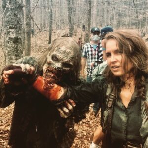 Laurie Fortier Instagram - Happy Birthday fellow Pisces Greg Nicotero 😘
Yep! That’s Greg dressed as a walker. I had the honor of being ‘bit’  by him. Good human. ❤️
.
.
.
#fb #bts #twd #twdedit #twdfans #twdfamily #gregnicotero #specialfx #makeup #walkers #zombieapocalypse #agatha #lauriefortier #onset #setlife #actress #actor #actorslife #senoia #piscesrule #onlyonelife