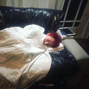 Laurie Penny Instagram - Double quarantine update: bedbugs inside, Corona outside. Currently sleeping on some binbags under a tablecloth for a few hours. Decontamination Station in the kitchen/porch. It’s all very extra!