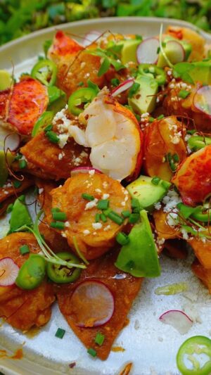 Lawrence Duran Instagram - 🦞Lobster Chilaquiles🦞 

Homemade chips
Salsa roja
Lobster tails
Quick pickled Serrano 
Radish 
Cotija 
Lobster oil
Micro cilantro
Avocado 
Scallions 
Chile threads 
Aleppo pepper 

#mexicanfood #comfortfood #lobster #chilaquiles #privatechef #wahlbergchef #family #blessed