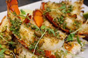 Lawrence Duran Instagram - Grilled Maine lobster tails/ Tequila lime butter/ Chimichurri/ Chili lime pepitas 
@flechaazultequila 
@spiceology 
@messermeister 
@campchef 

#sundayfunday #grillinandchillin #lobster #familyfun #privatechef #wahlbergchef #family #blessed