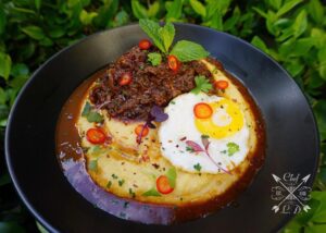Lawrence Duran Instagram - ~This Dish Makes Me Happy~
Braised lamb shank/ Cheesy polenta/ Fried egg/ Pickled Fresno’s .
.
.
.
.
.
.
#ComfortFood #BraisedLamb #Polenta #FriedEgg #Delicious #FunFood #FoodPorn #PicOfTheDay #FitFoodie #CheatMeal #FoodGoals #FitFam #IGDaily #InstaGood #Chef #ChefLife #PrivateChef #WahlbergChef #Blessed