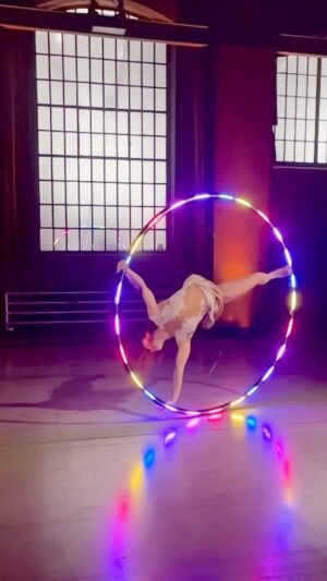 Lea Toran Jenner Instagram - Little bit of cyrwheel magic in slow motion ✨💖

Mastering a skill makes it often look seamless and magical to the audience. Slow down with us and enjoy mesmerising skills of @leatoranjenner with our LED cyrwheel 👏😊

This collaboration was definitely one of the brightest moments last year 💫

🎥 by @zuz.soutova 

#pyroterralightttoys #lighttoys #pyroterra #ledcyrwheel #cyrwheel #slowmotion #ledshow #cyrwheelartist #circusartist
