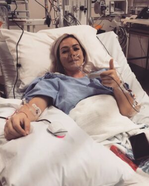 Leigh Holland-Keen Instagram - 3 weeks ago I underwent some pretty brutal surgery, surgery that I knew was risky but had to be done. I went to sleep after being told they would have to remove my left kidney, spleen, left ovary, part of my bowel, the 1kg liposarcoma and I'd have a "chemo washout" . I was so scared. It is so daunting being on your own and being faced with this. I also had an epidural prior to being sedated which brought back horrible memories of my birth but the team made me as comfortable as possible and gave me alot of reassurance which helped me in so many ways. 
.
.
I was extubated early as the surgery went well and I'm "fit and healthy" , the tumor was removed much easier than anticipated and they managed to keep the majority of my organs. I woke up with drips and drains coming out of everywhere - Arterial lines, central line, indwelling catheter, 2 abdominal drains, nasogastric tube, 3 intravenous cannulas, TPN, epidural infusion, and an oxycodone PCA. 
.
.
The next day, I had a cardiac arrest requiring CPR - I came round to a busy room full of medical staff racing around, working hard. I was told I would need a temporary pacing wire and the possibility of a pacemaker being inserted. After discussions with the cardiologist- they wanted to monitor me but attached to the defibrillator, an echocardiogram showed I have a bicuspid aortic valve with regurgitation (something I wasn't aware of). 
.
.
After 5 or 6 days in ICU I was finally moved to the ward - a few days in I developed an acute onset of new pain - I'd rather have back to back births than this pain again - I had an urgent CT at midnight to show I had pancreatitis. I was started on a continuous ketamine infusion which unfortunately made me hallucinate and I became agitated - that was stopped within 24hrs. After a couple of days things started to settle. Day by day, more drips and drains were being removed. I was in bed for 12 days so mobilising feels very weird and wobbly. 
.
.
This has certainly changed me - physically and mentally. I'll grow from this, I know it - but first I need to focus on getting my independence back and allowing myself to heal.