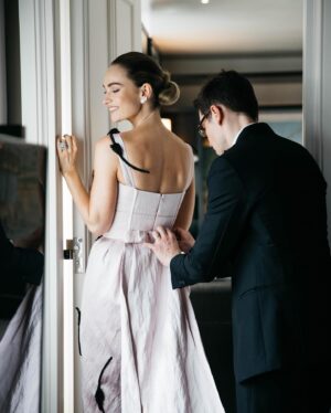 Lily James Instagram - My dream date in my absolute dream dress. @erdemlondon thank you so much for such a precious memory. I loved every moment of dreaming up this stunning gown with you and the @erdem team. The story and magic of this dress is truly breathtaking. You are a true artist and I feel so privileged to have worn
 your creation on this iconic carpet. @voguemagazine thank you for having me. 🖤
@rebeccacorbinmurray @valeriaferreiramakeup @halleybrisker @betina_goldstein @shilabeautycenter @skj @thebeautysandwich THANK YOU 💋
Thank you @iona.wolff for capturing these behind the scenes xx#