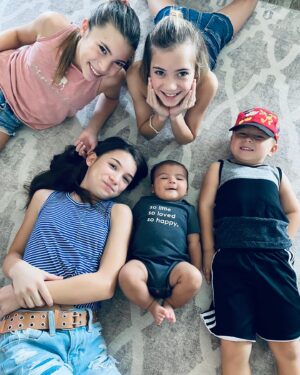 Lily Rose Smith Instagram - Not everyone knows this, but our family opened its doors to children needing a safe place to live. We have had lots of kids come through here and it’s hard when they leave. But we always remember and pray for them, hoping that they left here just a little bit better than when they came. But this little guy gets to stay FOREVER 😍 OFFICIAL welcome to Team Smith! 

Zander Maddox Smith

 #adoptionday #newchapter