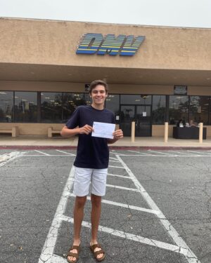 Lincoln Melcher Instagram - ignore my sock tan and ugly sandals and watch the road because now I can drive on it with my parent or legal guardian 😎