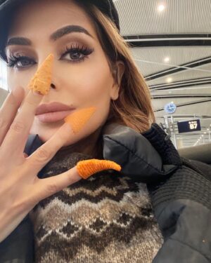 Lisa LoCicero Instagram - 😂entertaining myself with FaceApp and “America’s #1 finger hat!”… #bugles #detroit  #Airtport