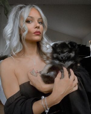Lisa Massé Instagram - M Y  F A M I L I A R
🔮

The witch has her little fur ball. My little boy 🖤 

#pomeranian #puppy #love #happy #cute #witch #blonde #funny #photoshoot #play #black