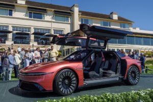 Lochlyn Munro Instagram - Absolutely THE coolest ride on the planet! Congrats to @deloreanmotorcompany for this amazing Alpha5! Looking forward your SUV as well! 😎🔥 #DeloreanRevealed
#italdesign