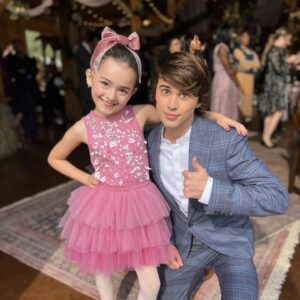Logan Allen Instagram - 🏡 Recognize this house❓
The best part of working on a show is gaining new family. Ella’s two older TV brothers on @sweetmagnoliasnetflix are true gentlemen.

This is @itsloganallen who plays Kyle. He was kind enough to escort Ella to the On Set Gifts shop where Ella added her signature to the cast wall (see previous post.)

🙏🏼 Grateful for the blessing of working with great people on a great show 🫶

⬅️ Swipe for a flashback to Ella and Logan from season 3. 

FUN FACT: One beautiful afternoon when Ella was shooting her first outdoor scene at the Townsend house, we took a walk from basecamp to the town center. We came upon this pretty yellow house and recognized it as the house she’d be shooting at later that night.

#sweetmagnolias #pouritout #tvactors  #onset #tvfamily #covington #covingtonga #younghollywood #hollywoodsouth #tvactors #tvactor