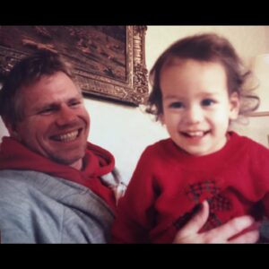 Lorene Scafaria Instagram - It’s been months and I still don’t have the words for this. Jimmy’s Dad went to wherever angels go. My uncle Dennis was the very best person. On Earth he was many things- a Brooklyn kid, a Merchant Marine, a high school teacher in London and on Guam, a chemical engineer, a cornerman for amateur boxing- but mostly he was Jimmy’s dad. The last 32 years were devoted entirely to his son’s around-the-clock care. Jimmy was born with an ultra-rare neurological disease called Alternating Hemiplegia of Childhood or AHC. “A one-in-a-million kid,” my uncle would say. And he is :) To see Dennis & Jimmy together was to get a front-row seat to true love- selfless, patient, dignifying, beautiful, warm, fun, unconditional love. The loss is simply immeasurable. Uncle Dennis was as good as it gets. He was a great listener and he loved people and wasn’t afraid to talk to strangers. And he was so cool. He talked reallll slowww and was the greatest storyteller. And the funniest in any room. You always knew where he was sitting by the sound of everyone around him laughing. He loved Korean films. He loved Norm’s Diner and Tiger’s Gym. And he could dance! Like really dance. He had incredible rhythm and such good taste in music and introduced me to my favorite songs. And we were pals. Real pals. I’m so grateful for the hours of in-depth conversations, the texts he would send that were so loving and genuine. All our adventures, Appalachia to Amsterdam. He was present. And he was the most authentic person. The absolute realest. And he loved coaching. He said it gave him such a sense of purpose and pride in his later years, helping fighters get better, building up their confidence, giving them the tools to protect themselves in the ring, just like he did with Jimmy. And me. He was a mentor and dear friend to so many, a big hearted baby brother and undyingly loving son. He had a hard life and the widest smile. He was one-in-a-million. And I loved him all my life. Rest In Peace, Cornerman. Thanks for all the songs. Say hi to Nanny & (Uncle) Joe & Cousin Donald & Little Lucky. I can hear them laughing now. You can find out more about AHC and donate at link in bio- ahckids.org.