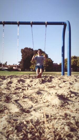 Lorenzo James Henrie Instagram - yeah I was that kid who swings way to seriously in elementary school 🤣
#backflip #throwback #old