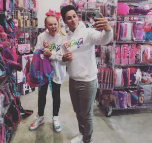 Lorenzo James Henrie Instagram - Thank you @itsjojosiwa for joining us for our pre show of @thisistheyearfilm !! David and I had a blast shooting at your amazing house... how do I get a Tesla like yours? 

#jojosiwa #thisistheyear #thisistheyearfilm #tesla