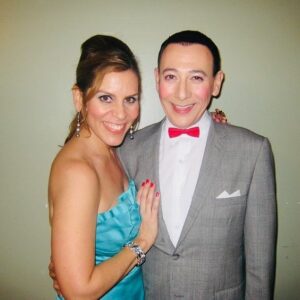 Lori Alan Instagram - I am devastated💔
I am so grateful I was allowed to watch Pee-wee when I was little, and then to work with him as an adult. 
He was hilarious, his real speaking voice was so sexy and fabulous, he would always check on me and leave me the most ridiculously inappropriate & beautiful voicemails for my birthday, he made you feel like you were the only person in the world and shared and thanked people so often and graciously.
I truly believe he allowed so many people, young, and old, to be exactly who they are, and ignite so much of our own imaginations. Our world is truly Technicolor, because of his artistry and imagination. 
I am so grateful to have met, and worked with the most amazing icons, and the additional newer cast members when we did the revival of his stage show at Club Nokia in Los Angeles.
he did a Q&A after every single show! 
He loved his fans, his friends, so deeply, always asked about my mom, my dogs and told me I could call him anytime about anything. 
Bless his heart, he would make a phone call to anybody to cheer them up and I’m borrowing his laugh right now to soothe my soul.
thank you for changing my life. Oh… I’ll never forget my audition to do all the female voices and
 understudy the ONE AND ONLY, Lynne Marie Stewart. A.k.a. Miss Yvonne. 
I was in full, crazy wardrobe, and I came twirling into the room, and he just laughed and said, “Hello Miss Yvonne’s understudy! You look beautiful today I will be reading with you“ got up, hugged me laughed told me I was beautiful and funny, and he wished me all the best in case I didn’t get cast. What a Mench. Please note in this post where he would like donations to be made. It’s important that we do that for all he did for us. 
#RIP in laughter, love and light 💔🤍💔🤍
 Your joy, sensitivity, indescribable talent, iconic presence on the WORLD will be surely missed, but never forgotten. 
forever and always, Chairy 🩵

@su2c  @alzassociation DONATE🙏🏼
#PaulReubens #PeeweeForever 

@phillamarr @keythefarley