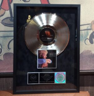 Lorrie Morgan Instagram - Another amazing moment during the @opry tribute to Keith Whitley... my kids and I have each been presented a copy of Don't Close Your Eyes, now, finally certified platinum by @rcarecords ! I'm still over the moon!

#platinumrecord  #certifiedplatinum #nashville #countrymusic #realcountry #grandoleopry #Opry #KeithWhitley
