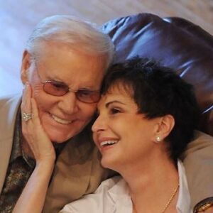 Lorrie Morgan Instagram - Forty years ago, Nancy Sepulvado married legendary country music singer @thegeorgejones , and her life would never be the same …
 
My friend, George Jones, was complicated, talented, tortured, and ultimately … saved! What a life and what a story. I’m really grateful to Nancy for sitting down to talk with me about George, life, the music business, family and more! It’s all on the new episode of War Paint with Lorrie Morgan, my new #podcast. Y’all, I am having so much fun with this!
THANK YOU for listening! @iheartmediaofficial , @applepodcasts , @spotify (Other podcast platforms are out there, too! Just search!) 🩷🩷🩷