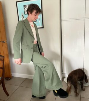 Louis Hynes Instagram - Been going to parties as a Harry Styles impersonator recently.  My dog is not impressed.