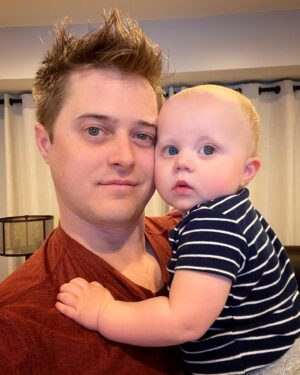 Lucas Grabeel Instagram - #unclenephewtime Lennon loves watching the Olympic ice skaters. He also wants you to know that he IS Batman. 
@autumngrabeel and @divebarrockstar made the coolest little human.