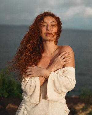 Lucia "Ginger" Molčányiová Instagram - My peaceful existence captured by @adelabellini at wonderful Bali🤍🙏🏻🏝️

I believe there is no bigger wealth for a human being than to feel at peace. Having the peace of mind, feeling calm, not in the conflict, not in stress, but having capacity to love yourself, radiating love towards others and creating beautiful presence. That has been my direction for some time now and even though it's not always that easy, life is so much lighter and more joyful when in peace. 

Wishing everyone of you to invite peace to your life today. You will feel better.🫂