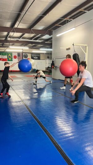 Luis Peña Instagram - Our camp here at @combat_concepts_academy_ started small but it keeps growing week by week! The great thing about having these small intimate groups is that we can have a little fun and the kids get an opportunity to learn some moves and techniques that don’t get taught traditionally. I used this bounce the ball drill to demonstrate timing before we got into one of my favorite slick takedowns the super duck! I wanna thank my campers for coming through these past couple weeks and @andrewsjj_judo  for helping me get this together! Remember guys summer wrestling makes winter champions! I run club practices for youth and high school every Monday Wednesday and when the school year/season starts we’ll be adding Friday as well, come check us out we offer great pricing and family packages if the parents want to jump in as well!