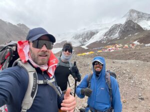 Luke Macfarlane Instagram - Day 4 of 14– Mt. Aconcagua (22,800’). Arriving at Plaza de Mulas (Base Camp). A trip this high requires patience with weather and the effects of thin air. I have two books on the go. Reading aloud Steinbeck’s Travels with Charly in the tent, and listening to @asgreer Less is Lost— weirdly similar.