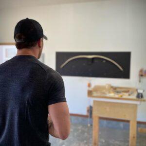 Luke Macfarlane Instagram - On my cross country trip I spent 3 days with the talented and soulful @organic.archer  Woodworker, Artist and bow hunter. Over the course of three days he showed me how to built a traditional American long bow. Shaping a rough hackberry timber, into this.  An excellent teacher, I look forward to refining my skills and building my next bow. Who wants me on their zombie team ?