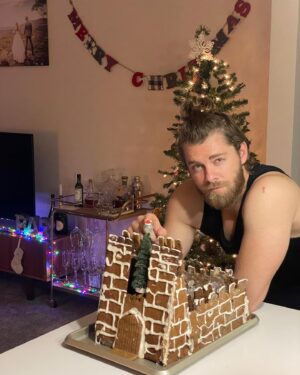 Luke Mitchell Instagram - So we’ve been binge watching @britishbakeoff & we decided to have our own Bake Off - A Gingerbread house challenge! Who wins? 1 (The rustic “battle hardened” Castle 😝) or 2 (The ridiculously cute Pony Stable ☺️) Pretty sure at least one of us is getting a  #PaulHollywood handshake… 👀 @rebeccaebreeds