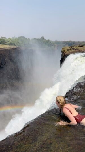 Mackenzie Mauzy Instagram - in wonder of a wonder of this wonderful world! 🌈 #earthday #victoriafalls #travel #zambia
