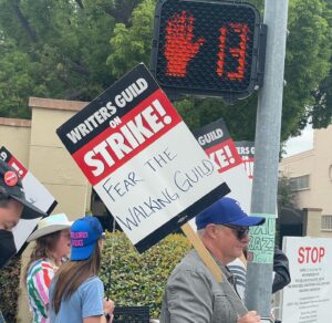Madisen Beaty Instagram - We’d all rather be working… but the positivity & good vibes were there yesterday striking at #warnerbros 

PAY YOUR WRITERS

What a highlight to run into so many friends, old & new. Unions stand together. 

To the writers - we fight alongside you. 

#sagaftra friends - we have until June 5th to authorize a strike, which does not mean we will strike, but sends a strong message. 

Oh & Happy Pride 🌸

#writersstrike #wga #sagaftra #unionstrong #payyourwriters #warnerbrothers #strike