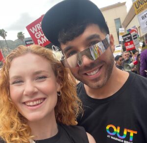Madisen Beaty Instagram - We’d all rather be working… but the positivity & good vibes were there yesterday striking at #warnerbros 

PAY YOUR WRITERS

What a highlight to run into so many friends, old & new. Unions stand together. 

To the writers - we fight alongside you. 

#sagaftra friends - we have until June 5th to authorize a strike, which does not mean we will strike, but sends a strong message. 

Oh & Happy Pride 🌸

#writersstrike #wga #sagaftra #unionstrong #payyourwriters #warnerbrothers #strike