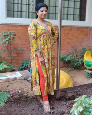 Mahalakshmi Shankar Instagram - The vibrant yellow color and the floral pattern give it a fresh and lively feel. The fit and flare design is flattering and the detailing around the neckline adds a touch of elegance. Overall, it’s a beautiful and stylish outfit from @aditiboutique_attur that suits anybody very well.