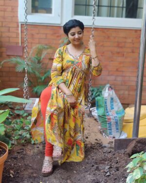 Mahalakshmi Shankar Instagram - The vibrant yellow color and the floral pattern give it a fresh and lively feel. The fit and flare design is flattering and the detailing around the neckline adds a touch of elegance. Overall, it’s a beautiful and stylish outfit from @aditiboutique_attur that suits anybody very well.