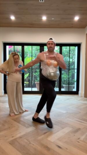 Maksim Chmerkovskiy Instagram - First of all, THIS SUCKED! 
Secondly, I took it off my body as soon as we filmed this video…..ONCE!
Thirdly, my diaphragm is still upset at me for agreeing to do this!
Fourthly, @petamurgatroyd was way too happy the whole time 😤 
Fifthly, WOW how uncomfortable this is! I cannot believe Peta ties her shoes, holds Rio all day, still dances and in general makes it look so easy 🤷🏻‍♂️🤯

I hope she doesn’t make me do this again.