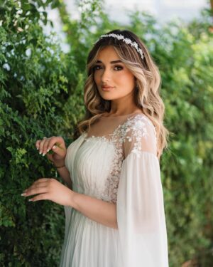 Malak Ahmed Zaher Instagram - A heart can be the most beautiful thing about a person 🤍
So leave footprints of love and kindness wherever you go ✨

My amazing team✨:

Creative / art director @mennakotbb 
Photographer : @kareem.muhamed 
Director&DOP: @ziad.raslan 
Videography: @alynegmm @_thefilmmakers 
Stylist : @mennakotbb 
Designer : @tayacouture 
Jewelry : @iramjewelry_ 
Makeup artist : @makeupbysalmash 
Hair dresser : @alfredandmina @alfredmakram 
Locations : @stregisnewcapital