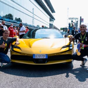 Marc Gené Instagram - Bellisimo oggi avere i campioni italiani olimpici a #MonzaGP. It was great doing a lap with the @ferrari #SF90 and @gianmarcotamberi @scuderiaferrari crazylongjumper 🥇🥇
