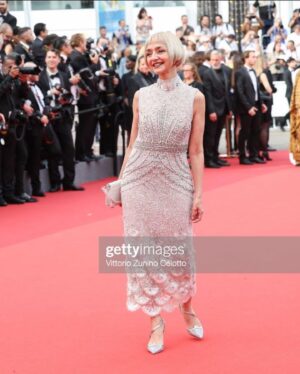 Maria de Medeiros Instagram - Day One as the President of the “Jury de la Citoyenneté” in Cannes. 16 May 2023 - Maria de Medeiros wears VIVIENNA LORIKEET beaded dress and ROGER VIVIER shoes to attend the "Jeanne du Barry" Screening & opening ceremony red carpet during Cannes Film Festival.