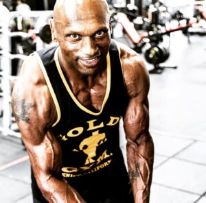 Mark Rhino Smith Instagram - Thank you very much @muscleandfitness  Link in bio.. for a fun interview @billdobbinsphoto @themsolympia  @goldsgym 🙏🏾❤️🙏🏾 Although my training has changed. #bodybulding will always have a special place in my heart. It taught me to put that work in 24/7 training, nutrition and recovery. Keep moving forward everyone @thegymvogue 💯 Thanks son @brodietyyoungsmith for rolling with your old man 🤪😂

#live
#life 
#health 
#love 
#fitfam