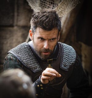 Mark Rowley Instagram - Finan at the board meeting: ‘Season 5 will look great… The Danes might have nicely trimmed beards… but our mail is from Friankia… Stylish… Practical… and fits this weeks theme at the Wessex Fashion show’ #fashion #900ad #season5 #netflix @thelastkingdom