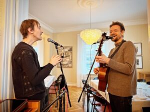 Markéta Irglová Instagram - A few things 🤗 1. I got to begin the new year by having the honor to play a mini concert with my friends @helgistrombone and @peturben at the historic @hofdi_lodge during a special night in honor of our dear mayor of Reykjavík @daguregg ♥️ thank you 🙏
2. The gorgeous painting in first photo is by @eggert.petursson , an Icelandic painter and my hero 🌟 How nice to spend time in the presence of one of your exquisite pieces dearest Eggert.
3. The sweater I am wearing, I reaaaaally wanted it for Christmas and my dear @_m_i_o_____ made sure my wish came true. There were only 20 of them made so the likelyhood was small! Thank you @bahns_rvk , for letting one of those 20 come to me ♥️ 

📸 @_m_i_o_____ & Anna Karen 🙏