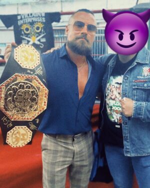 Martin Scurll Instagram - mAAAnifesting this… 

To all my fans, thank you. Thank you for your continuous love and support, and thank you for joining me on this Villain’s journey. It means more to me than you’ll ever know. I’m forever grateful and love you all. Let’s continue to cause a spot of bother across the world, and never forget that the best view comes after the hardest climb! Stick at it everyone, I’m cheering for you all, and most importantly if you’re ever in doubt, stick to my motto - ‘create don’t hate!’ ☔️🖤☔️