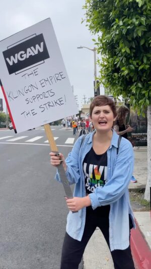 Mary Chieffo Instagram - Don’t mess with the Klingon Empire!! 🔥🔥🔥

Repost from @larrynemecekstrekland
•
Never argue with a Klingon… especially when it’s Chancellor Mother L’RELL!

Mary Chieffo sprang this on me herself at Star Trek Day outside Paramount for the latest theme picket day in the WGA writers strike… and of course her Klingon is pristine. 

THOSE AMPTP BOYS DON’T HAVE A CHANCE. 😄🖖

#wherestheklingonemoji #wgastrong #sagaftrasolidarity #startrek #startrekdiscovery #discovery #drtrek #writersstrike #klingon #trekland #picketsign